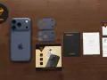 iPhone z akcesoriami Supero: szkła hartowane na aparat, ściereczka, naklejka do kurzu.